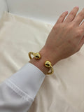Rounded spiral bangle
