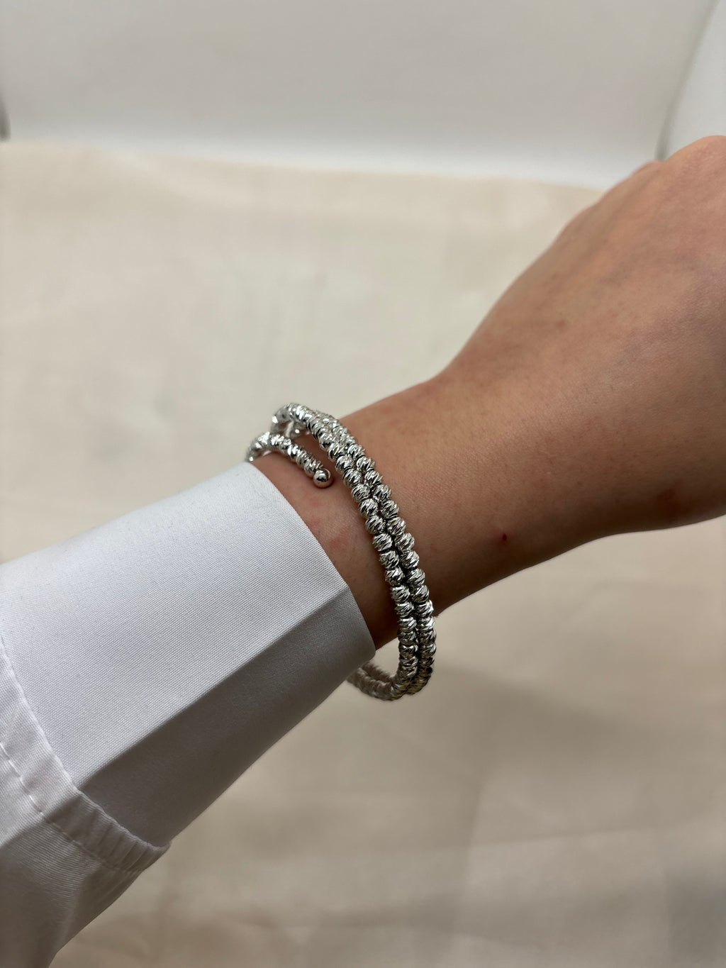 Swirl silver bangle