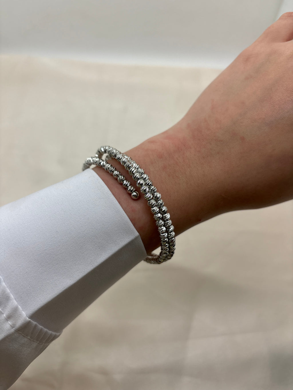 Swirl silver bangle