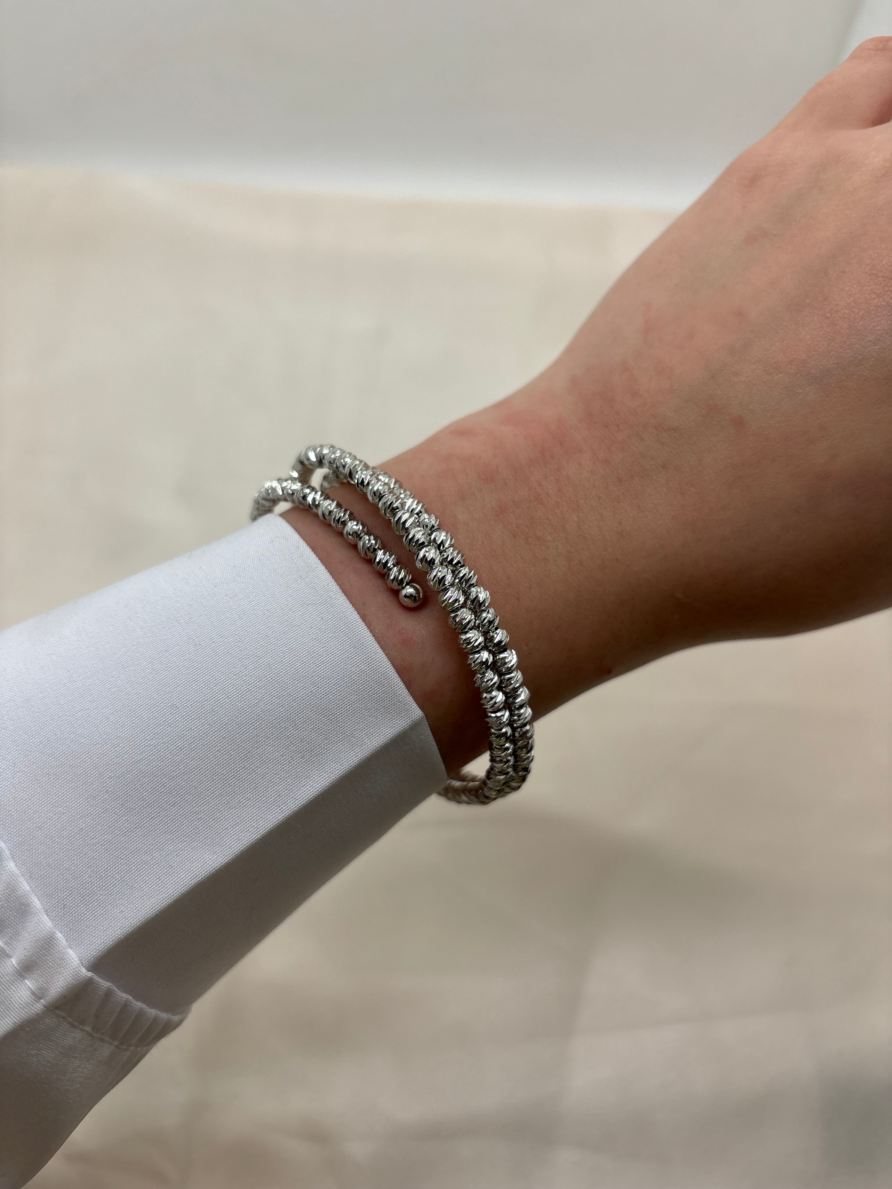 Swirl silver bangle