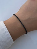 black thin tennis bracelet