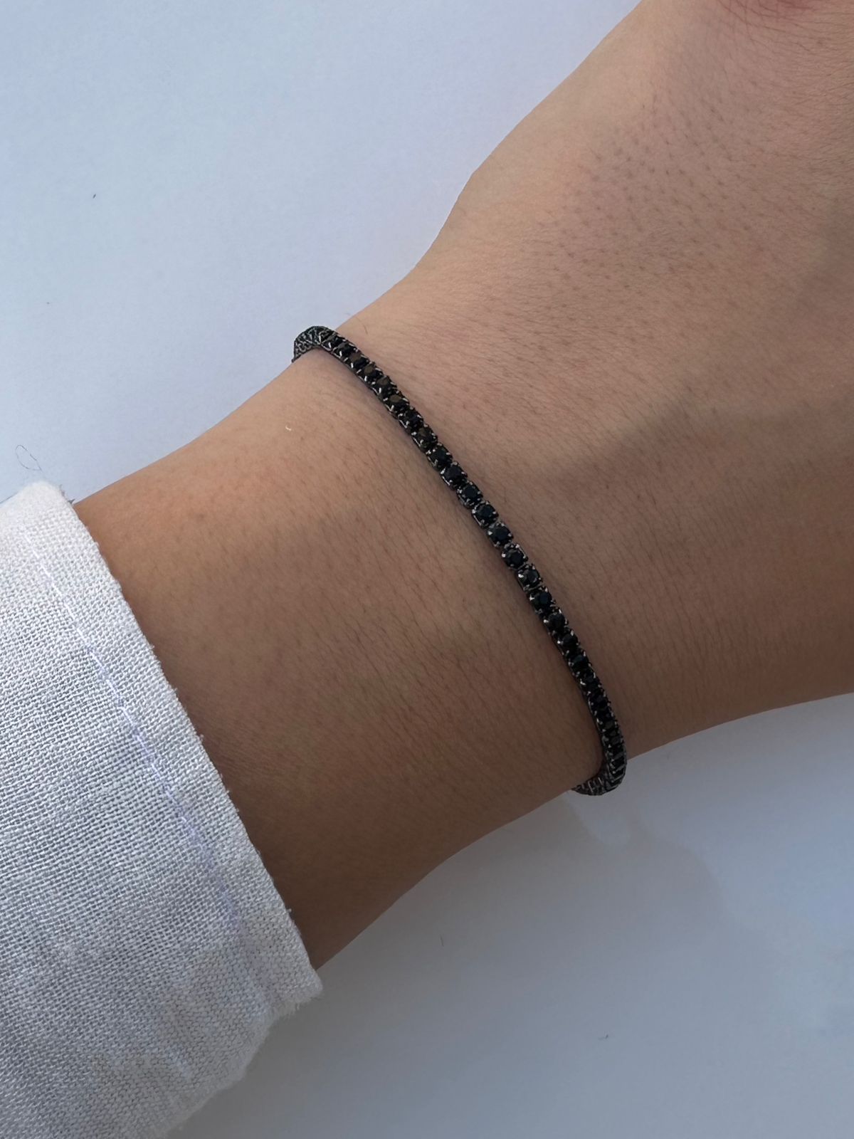 black thin tennis bracelet